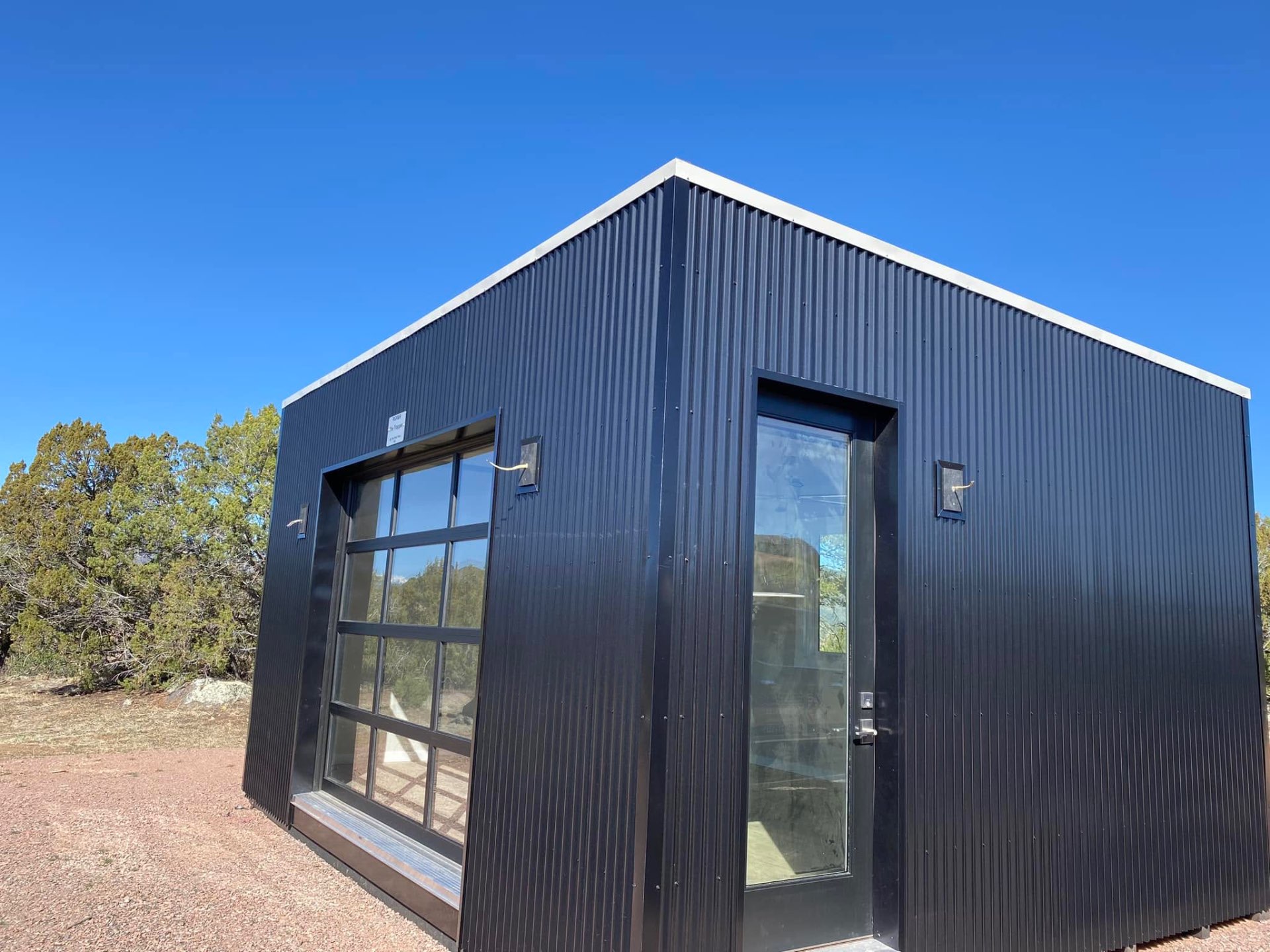 Modern black metal shed