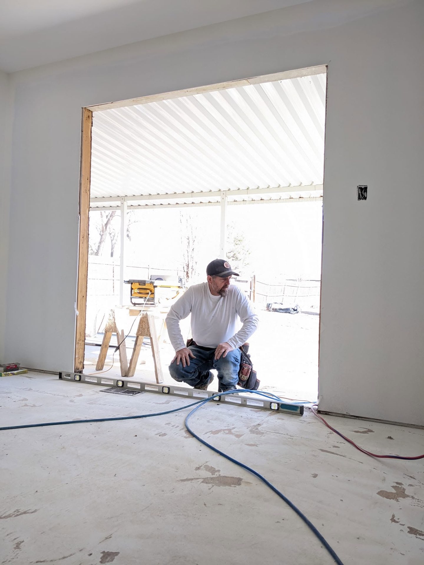 Merv, owner of Merv's Home Solutions, on a job site